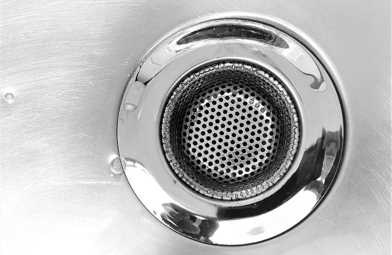 clean stainless steel drain with filter slightly wet
