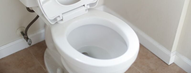 white toilet clean with toilet seat up