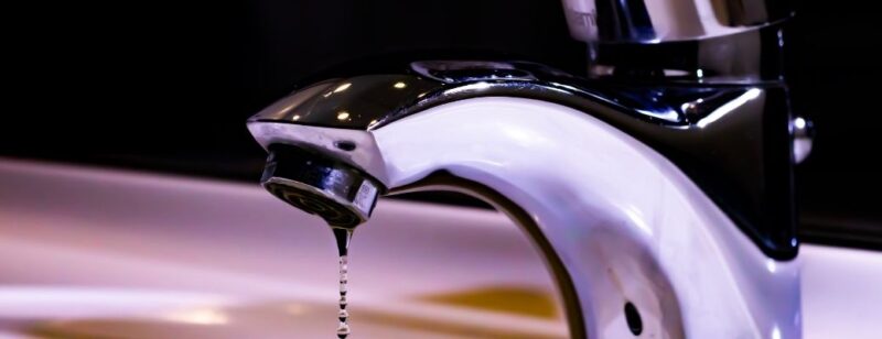 dripping faucet polished nickle finish in bathroom