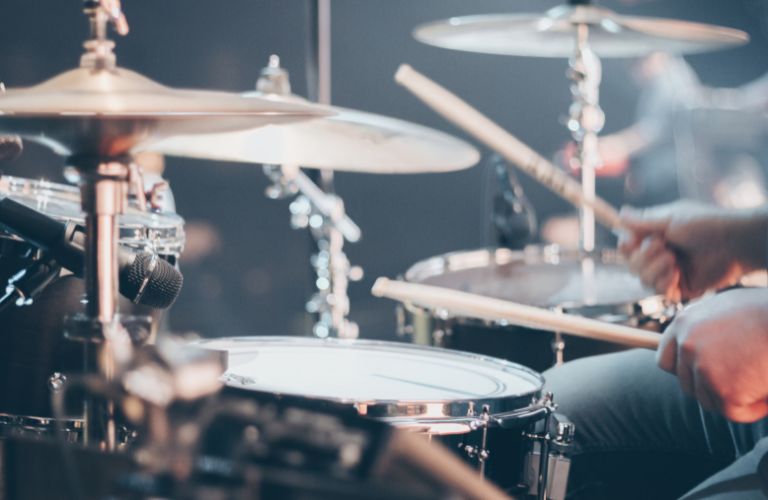 person playing drums with matched grip