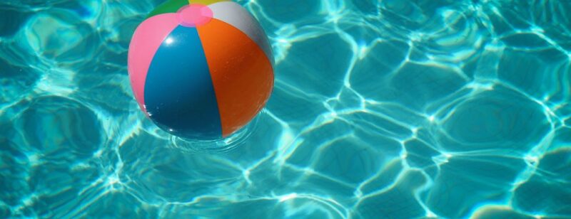 beach ball floating in pool