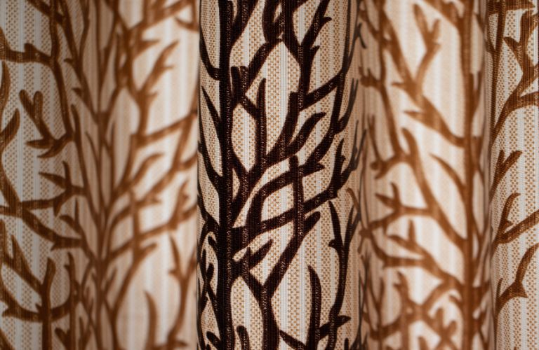 shower curtain close up that look like branches of a tree