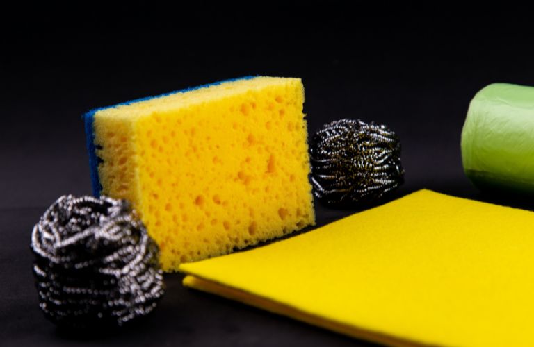 sponges and steel wool with a scouring pad for deep cleaning
