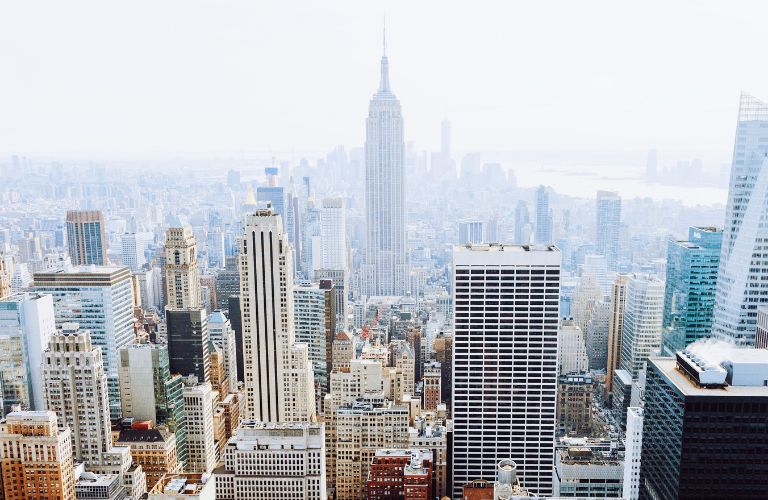 New York City seen from above with the Empire State building in the distance