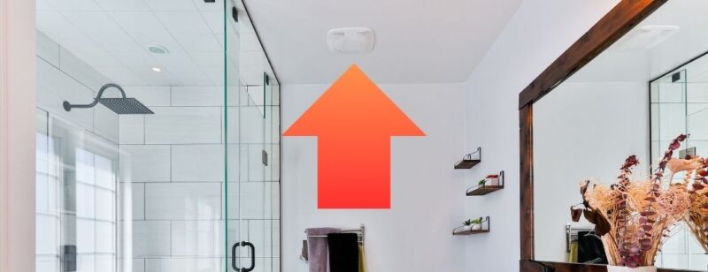 orange and red arrow pointing up to a bathroom exhaust fan